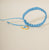 PULSERA TEJIDA OJO PROTECTOR AZUL